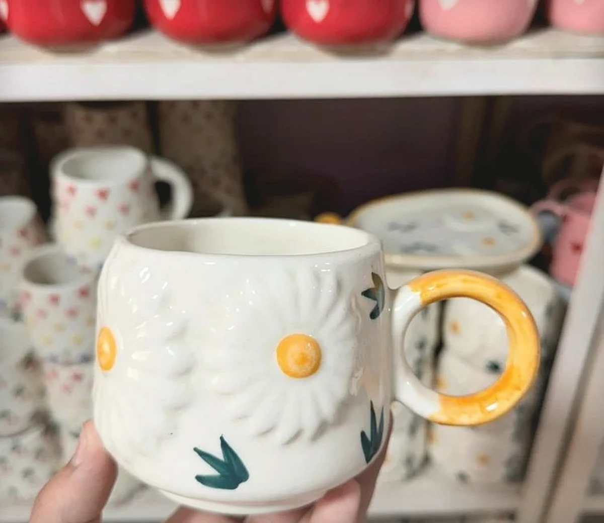 A ceramic cup styled as a morning gift