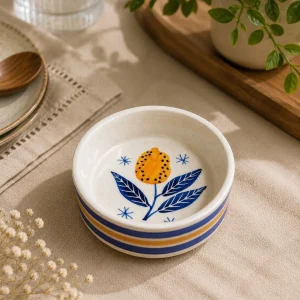 The Plush Republic Hand-Painted Orange Flower Ceramic Bowl – Blue Leaves & Stripe Rim