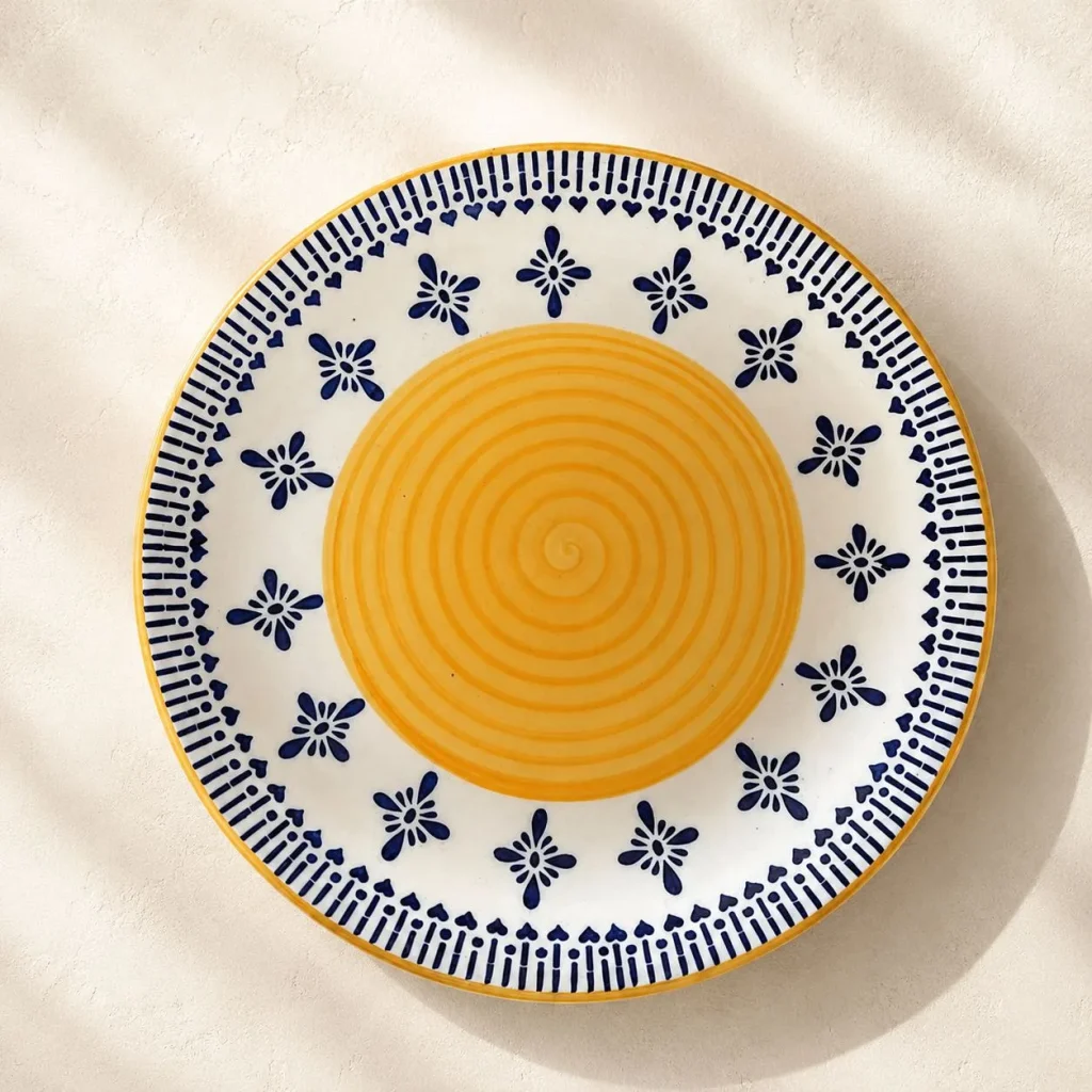 The Plush Republic Hand-Painted Yellow Spiral Ceramic Dinner Plate with Blue Floral Border