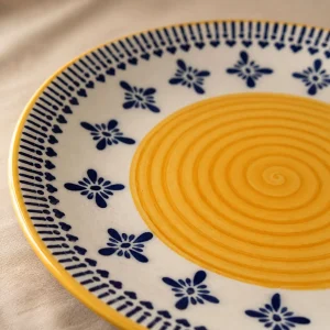 The Plush Republic Hand-Painted Yellow Spiral Ceramic Dinner Plate with Blue Floral Border
