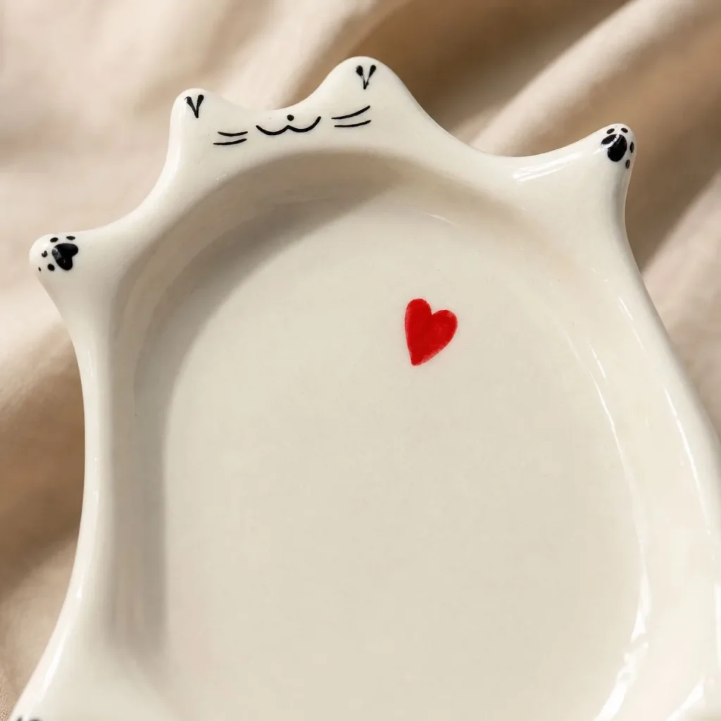 Handcrafted Cat Heart Trinket Dish (White) styled in a home setting